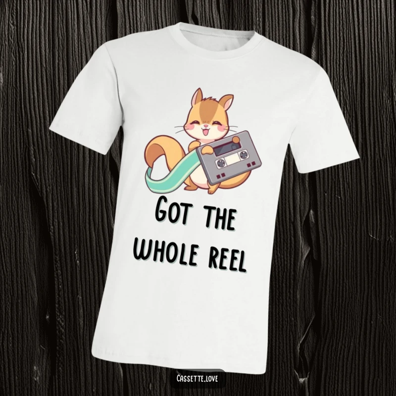 Funny graphic t-shirt featuring a playful squirrel joyfully unwinding the flowing ribbon from a retro cassette tape.