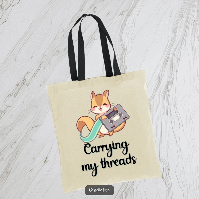 Funny tote bag featuring a playful squirrel joyfully unwinding a long, flowing ribbon from a retro cassette tape spool.